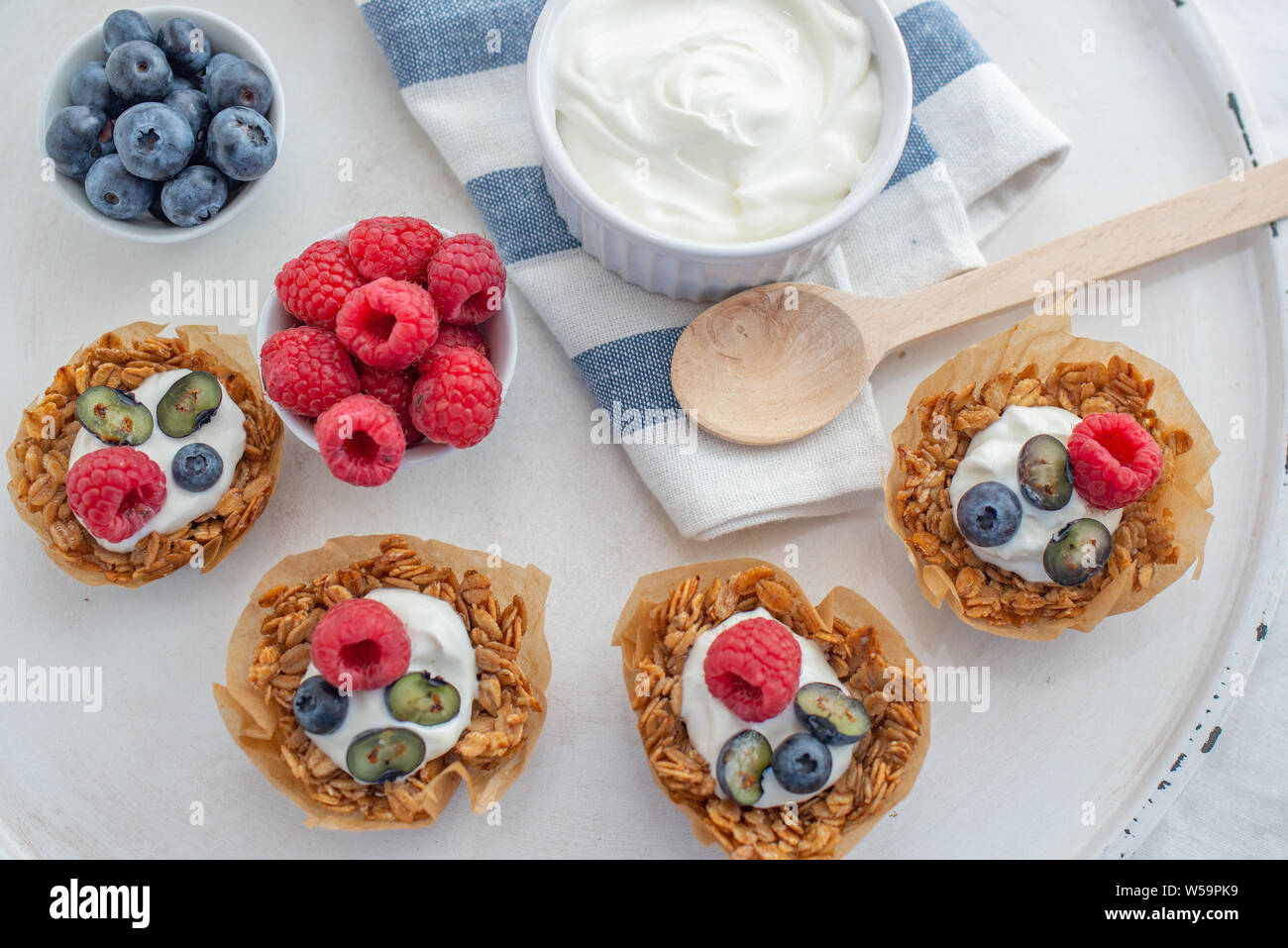 Granola Cups with yogurt and berries Stock Photo Alamy