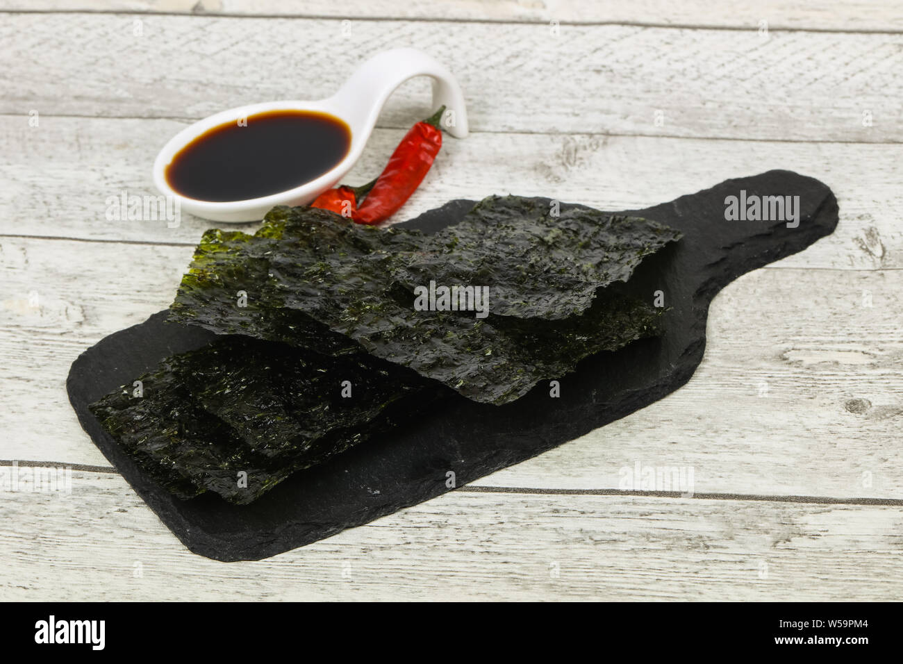 Tasty Nori chips with soya sauce Stock Photo Alamy