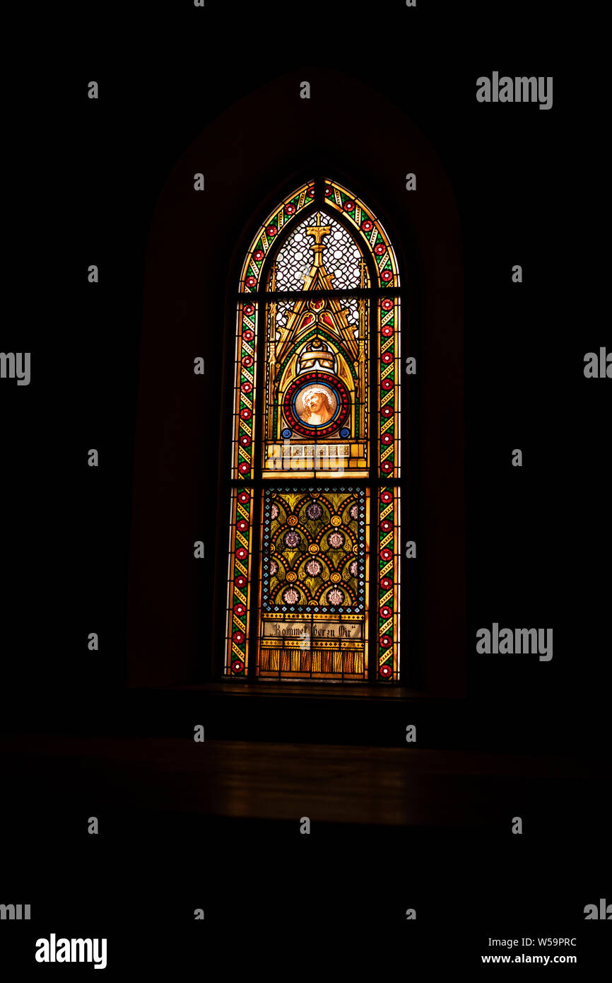 A stained glass window in the Thomaskirche (St Thomas Church) in Leipzig, Germany. Stock Photo