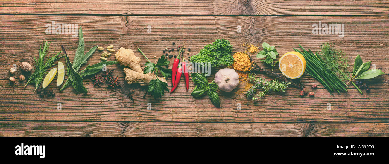 Herbs and spice on wooden table Stock Photo