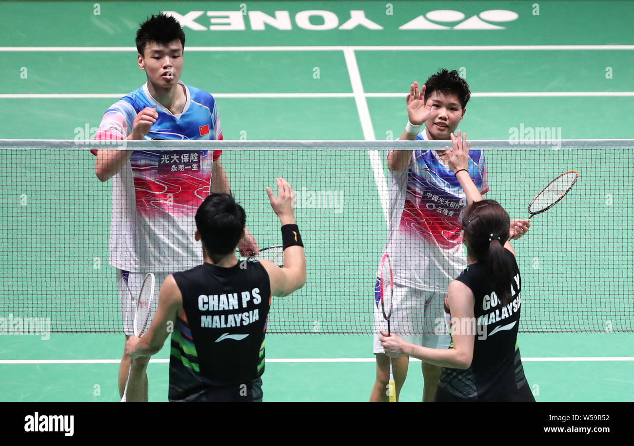 Tokyo. 27th July, 2019. Wang Yilyu (1st L)/Huang Dongping (2nd R) of China  greet Chan Peng Soon (2nd L)/Goh Liu Ying of Malaysia after their mixed  doubles semifinal at Japan Open 2019