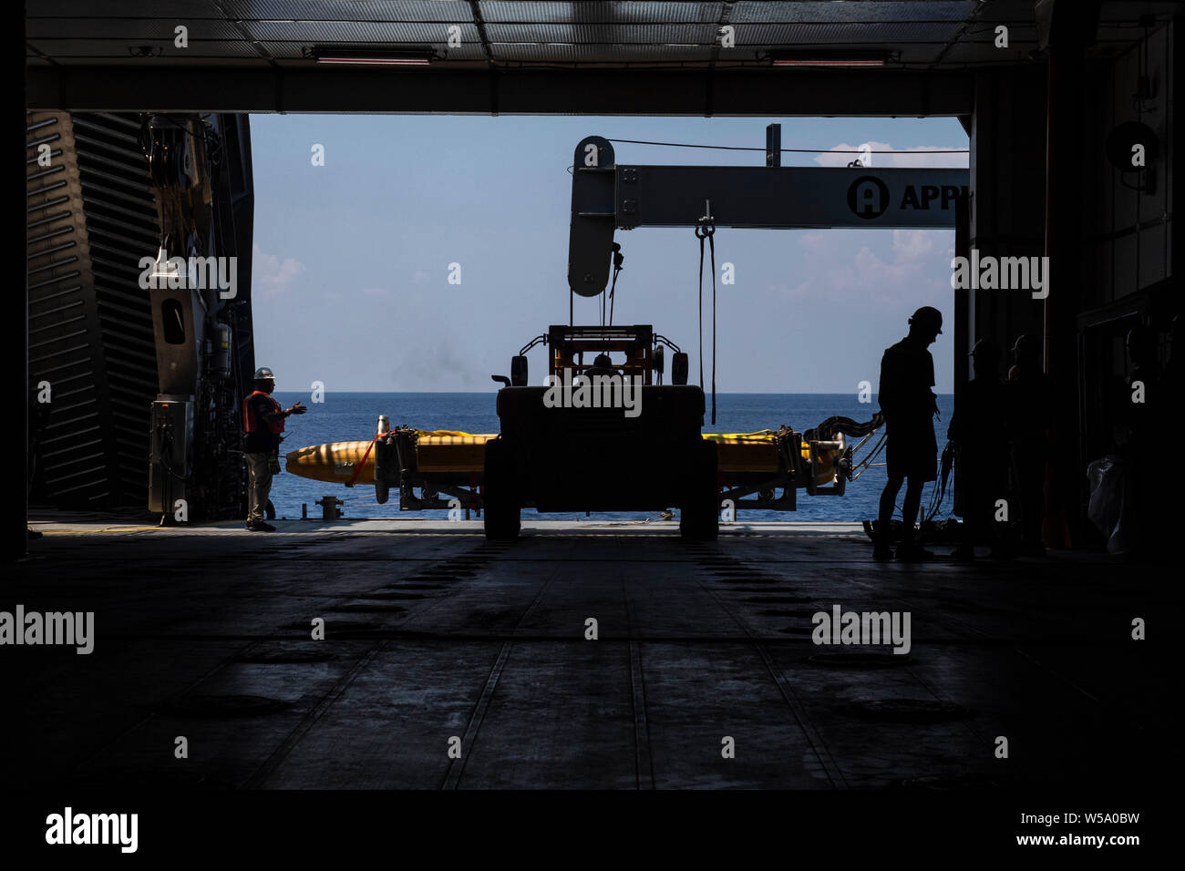 190724NKK3944021 ATLANTIC OCEAN (July 24, 2019) Crewmembers prepare for a Knifefish unmanned