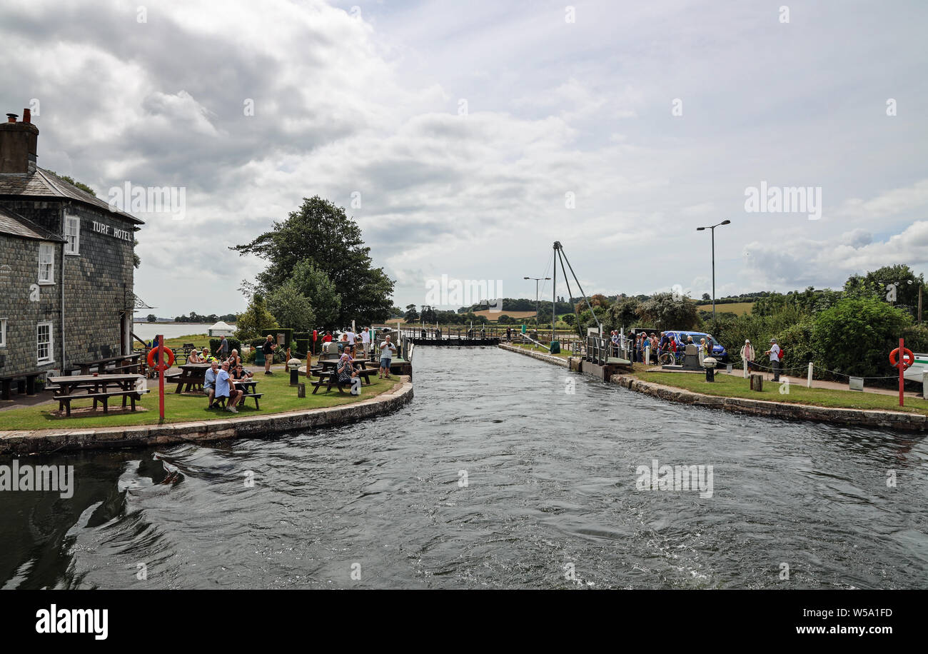 Exeter Canal Cruise, up Europe’s oldest working ship canal. Stuart Lines Cruises. Turf Lock and Hotel. Stock Photo