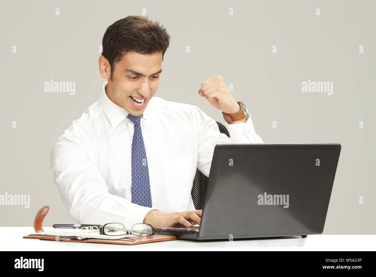 Businessman working on a laptop Stock Photo