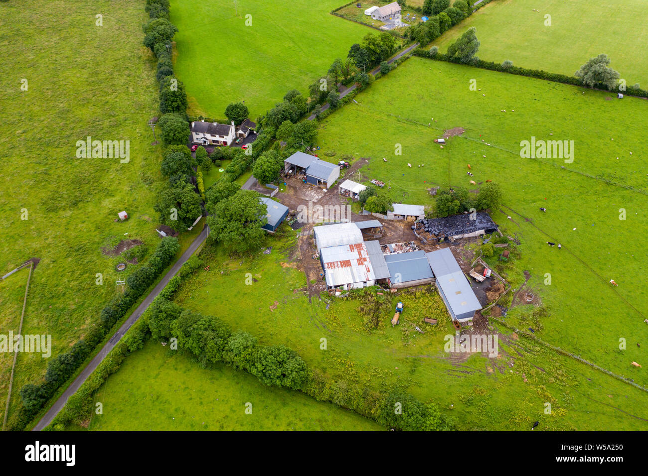 Aerial view of a traditional Irish farmhouse and farm in County Kildare ...