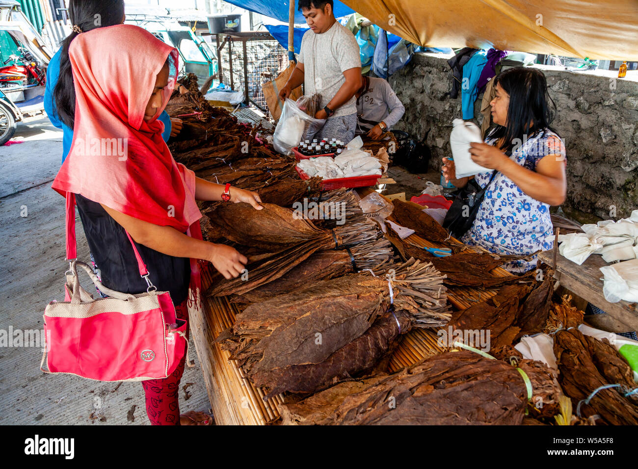 Tobacco Leaves For Sale, Market Day, Banaue, Luzon, The Philippines Stock  Photo