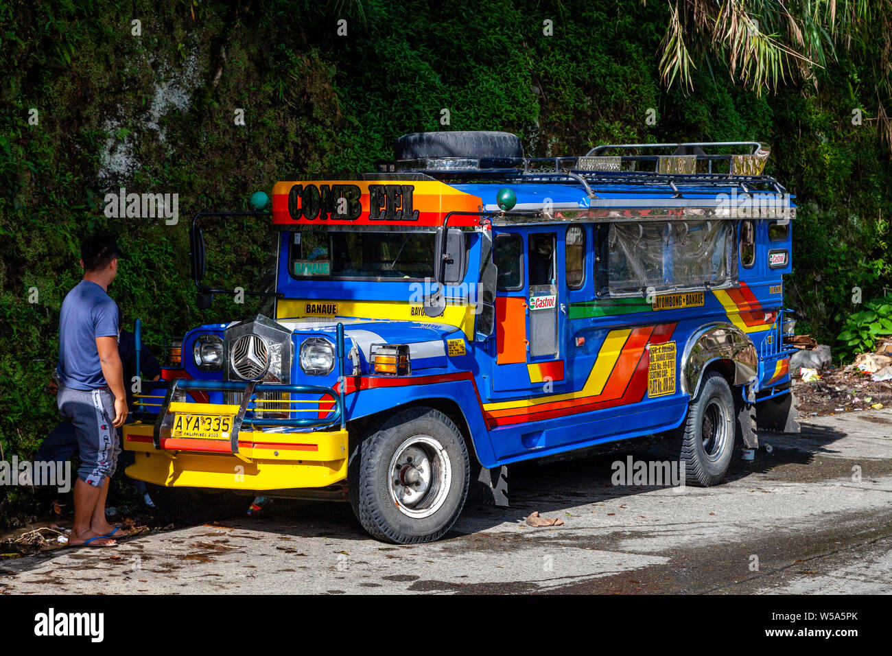 A Colourful Jeepney Bus Waits To Pick Up Passengers, Banaue, Luzon, The Philippines Stock Photo
