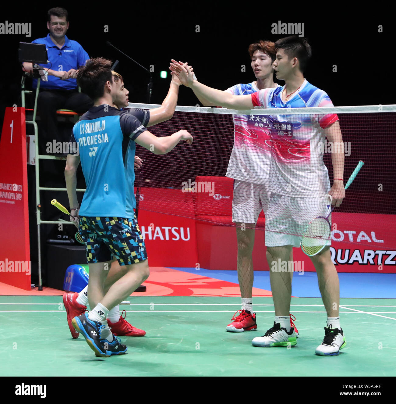 Tokyo, Japan. 27th July, 2019. Marcus Fernaldi Gideon (2nd L)/Kevin Sanjaya  Sukamuljo (1st L) of Indonesia shake hands with Li Junhui (2nd R)/Liu  Yuchen of China after the men's doubles semifinal at