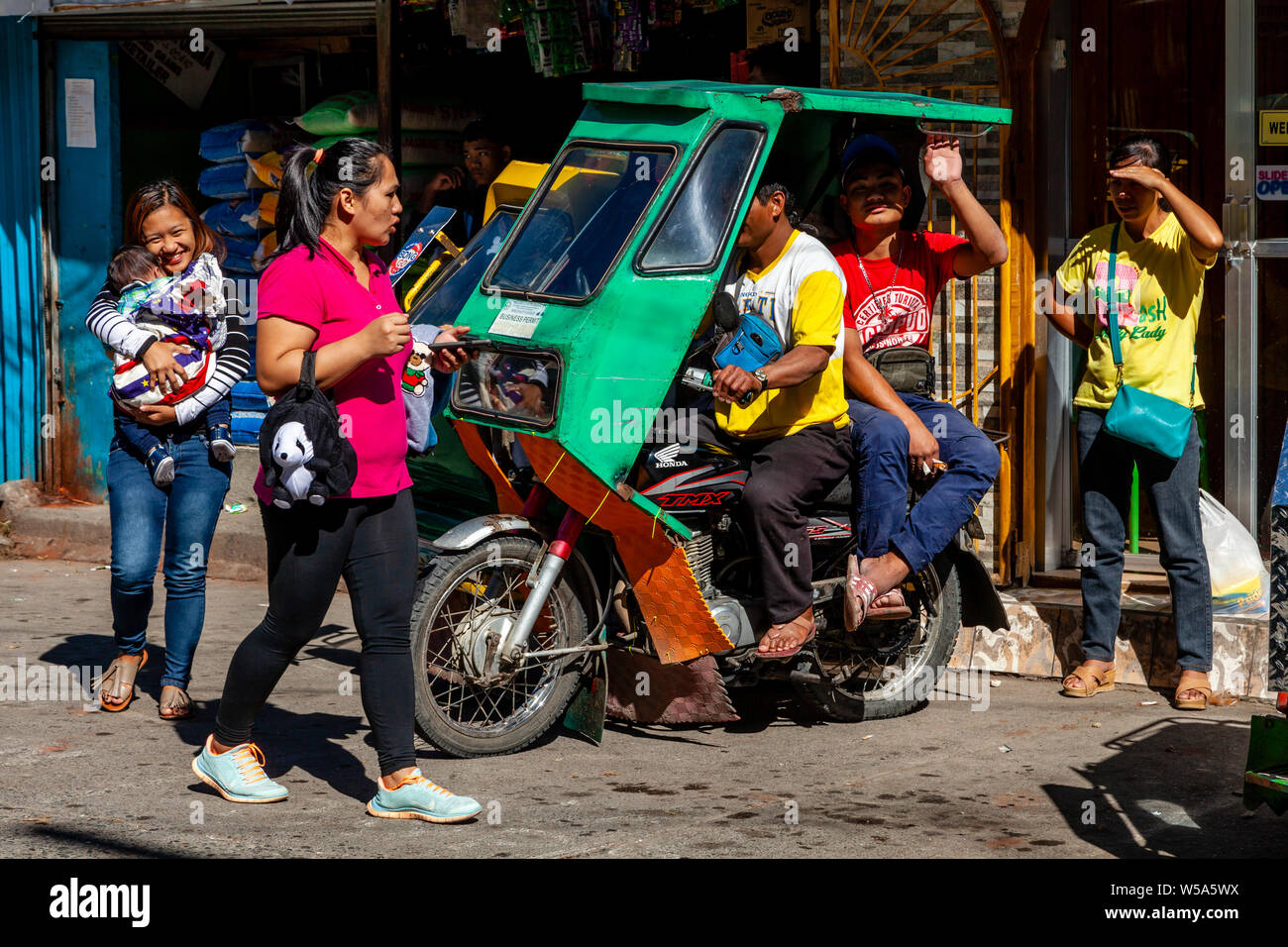 Local People Travelling By Tricycle, Banaue, Luzon, The Philippines Stock Photo