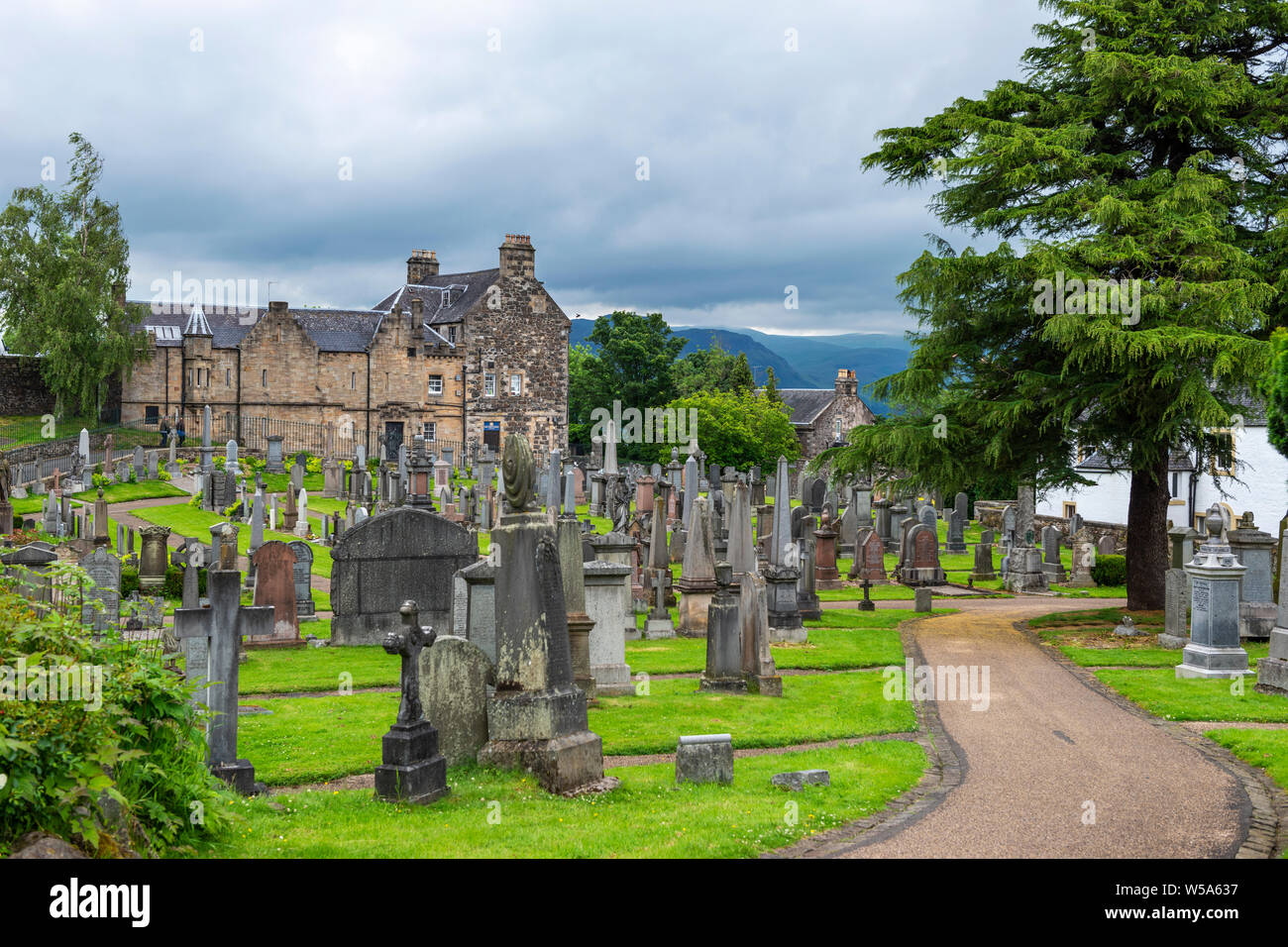 Old Town Cemetery with Portcullis Hotel in background - old town of Stirling, Scotland, UK Stock Photo