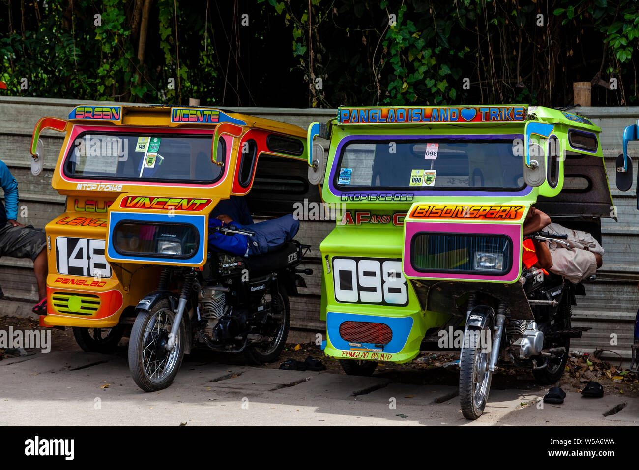 A Row Of Colourful Tricycles, Alona Beach, Bohol, The Philippines Stock Photo Alamy
