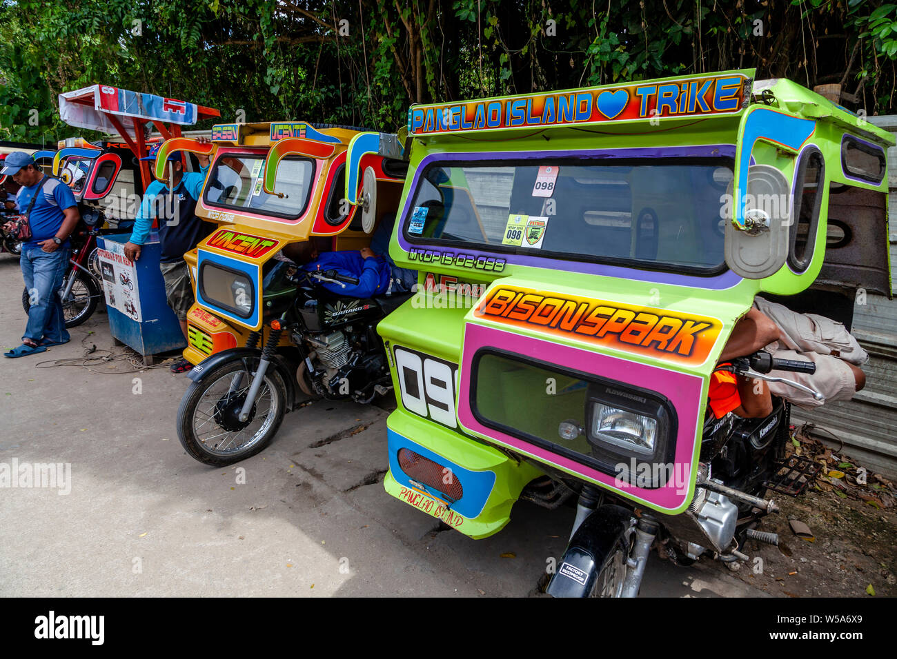 A Row Of Colourful Tricycles, Alona Beach, Bohol, The Philippines Stock