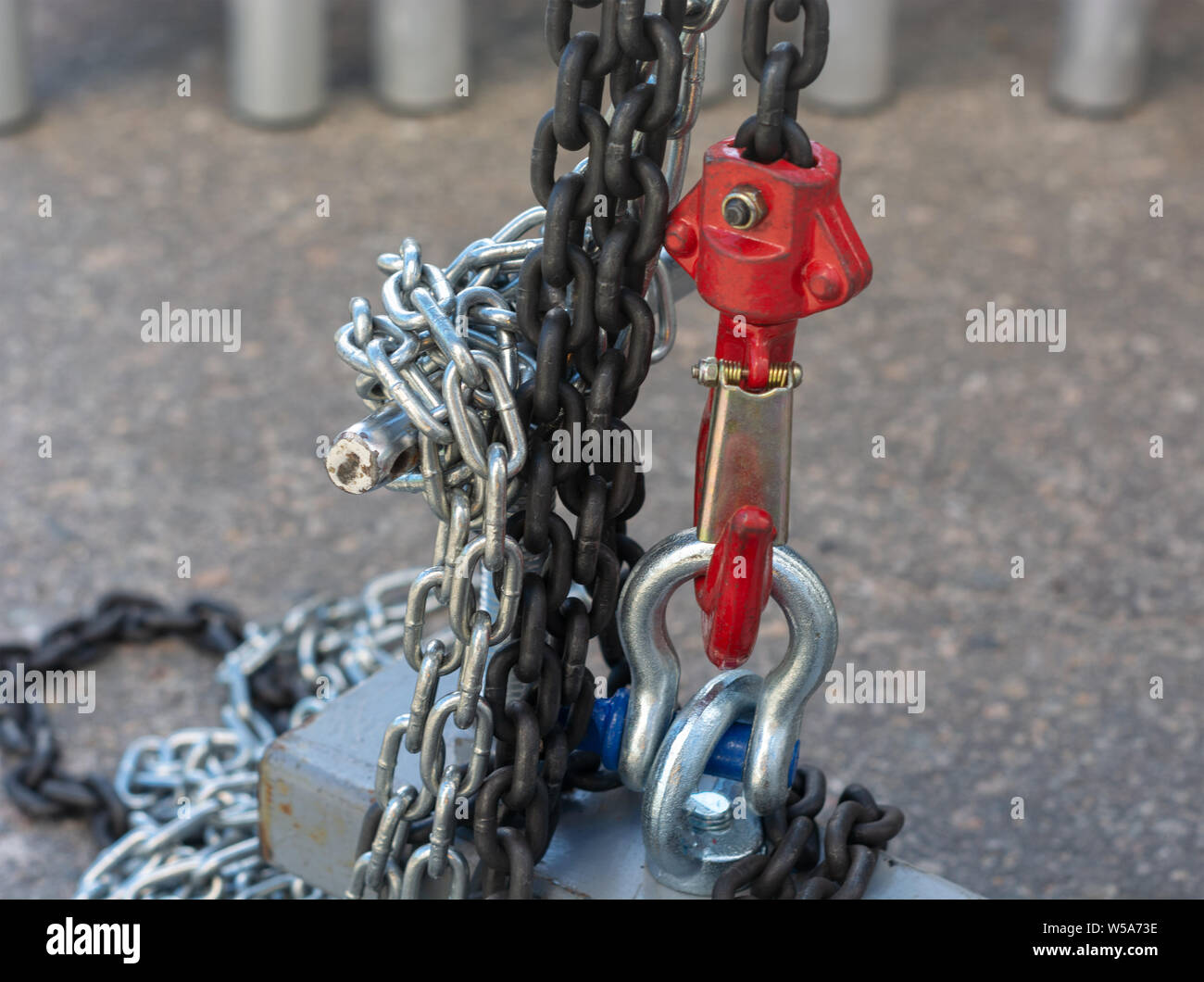 Red chain winch close up sunny day Stock Photo Alamy