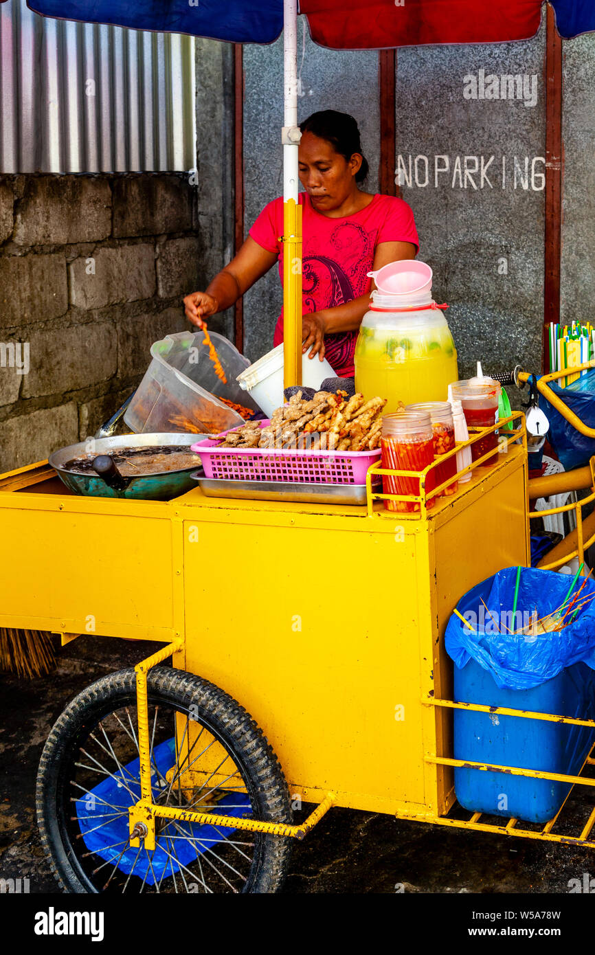 A Woman Selling Street Food, Tagbilaran City, Bohol, The Philippines