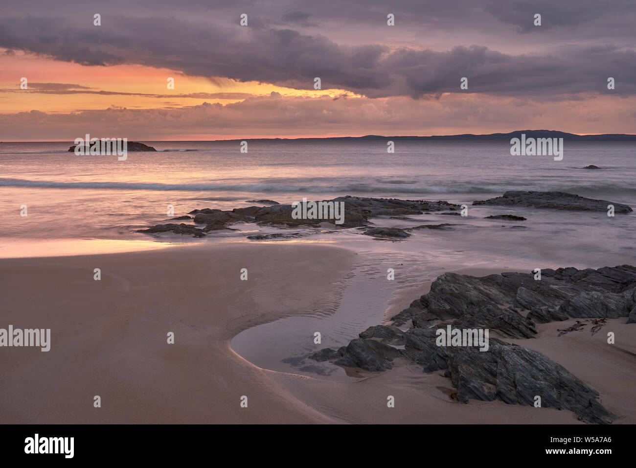 Sunset over Laggan Bay from the Big Strand, Kintra, Isle of Islay, Argyll, Scotland Stock Photo