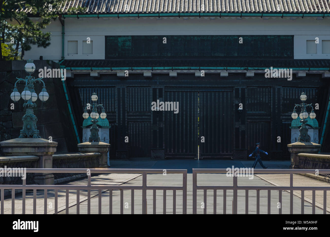 Seimon-ishibashi (Stone Bridge) at imperial palace in Tokyo, captured in daylight during changing of guards, Japan October 2018 Stock Photo