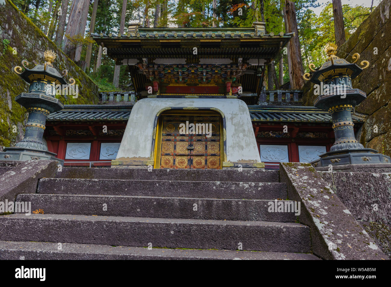 Gate to Tokugawa Iemitsus last resting place at the inner district of Nikkos Tosho-gu with splendering rich golden artwork, Japan October 2018 Stock Photo