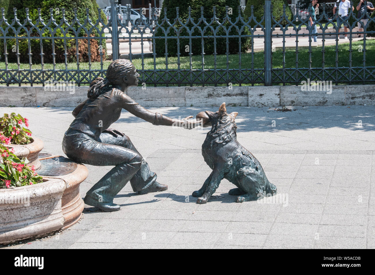 Around Budapest A girl with her dog sculpture on the banks of the