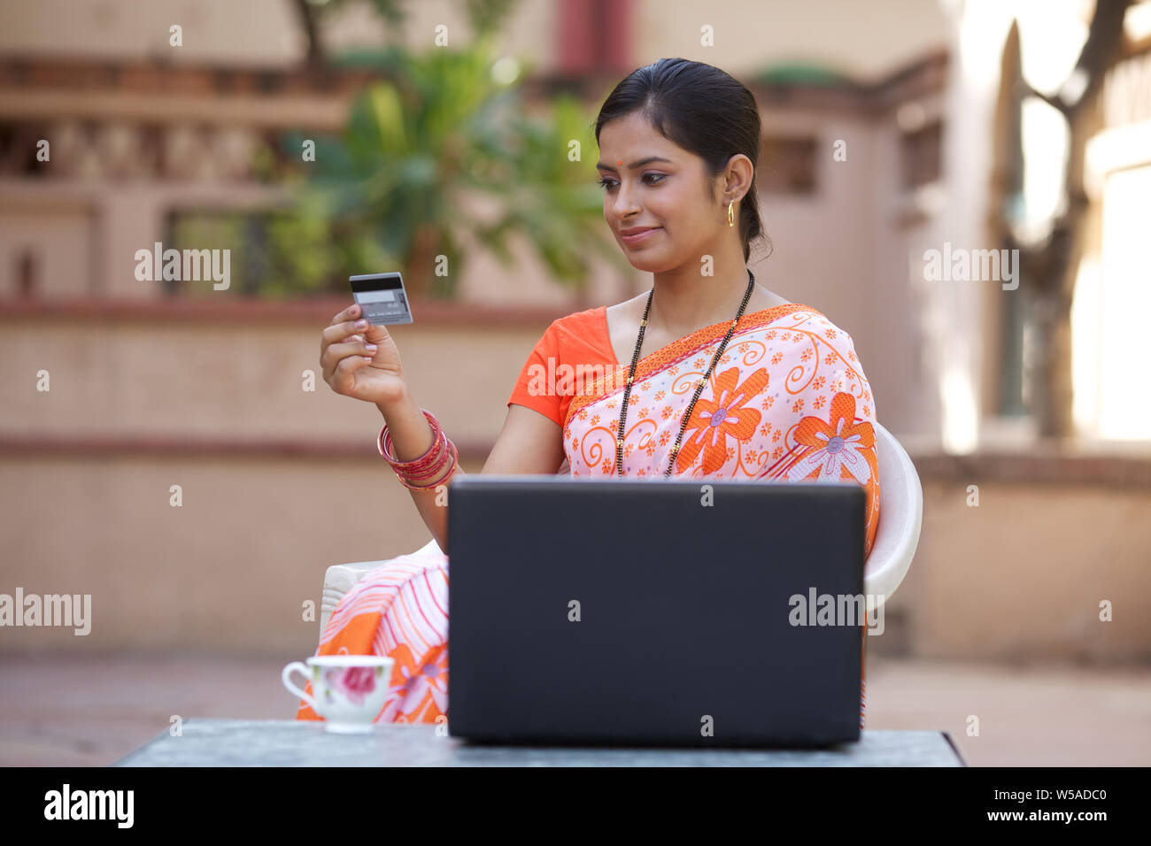 Woman doing online shopping Stock Photo