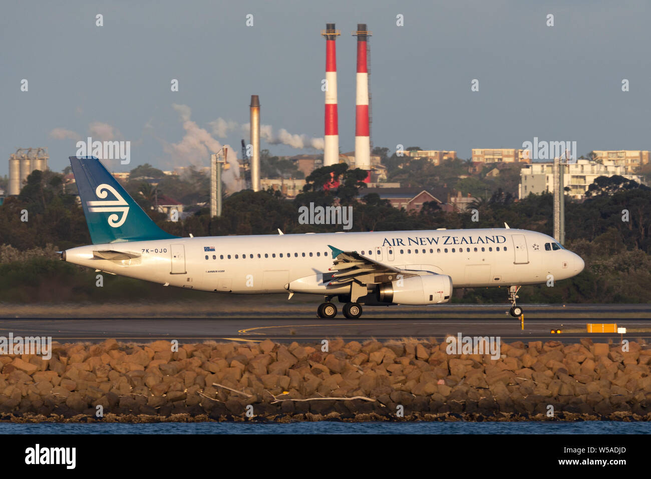 Air New Zealand Airbus A320 twin engined commercial airliner taking off from Sydney Airport. Stock Photo