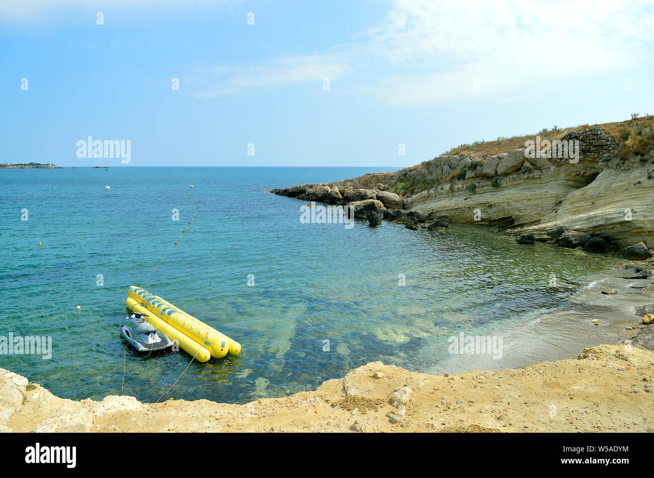 Jet ski and Inflatable for hire in Sissi harbour in Crete the largest and most populated of the Greek islands Stock Photo