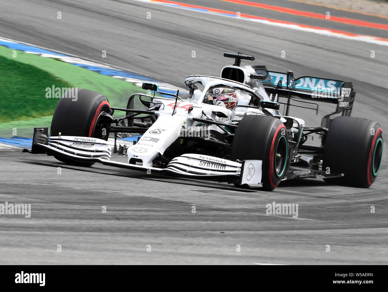 Hockenheim, Germany. 27th July, 2019. Motorsport: Formula 1 World Championship, Grand Prix of Germany. Lewis Hamilton from Great Britain of the Mercedes-AMG Petronas team drives on the race track during the third free practice session. Credit: Uli Deck/dpa/Alamy Live News Stock Photo