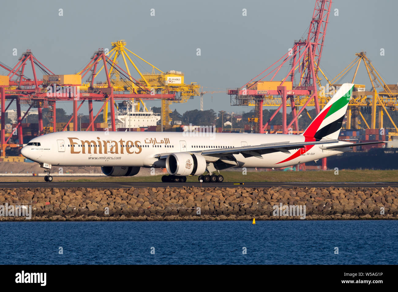 Emirates Boeing 777 aircraft landing at Sydney Airport. Stock Photo