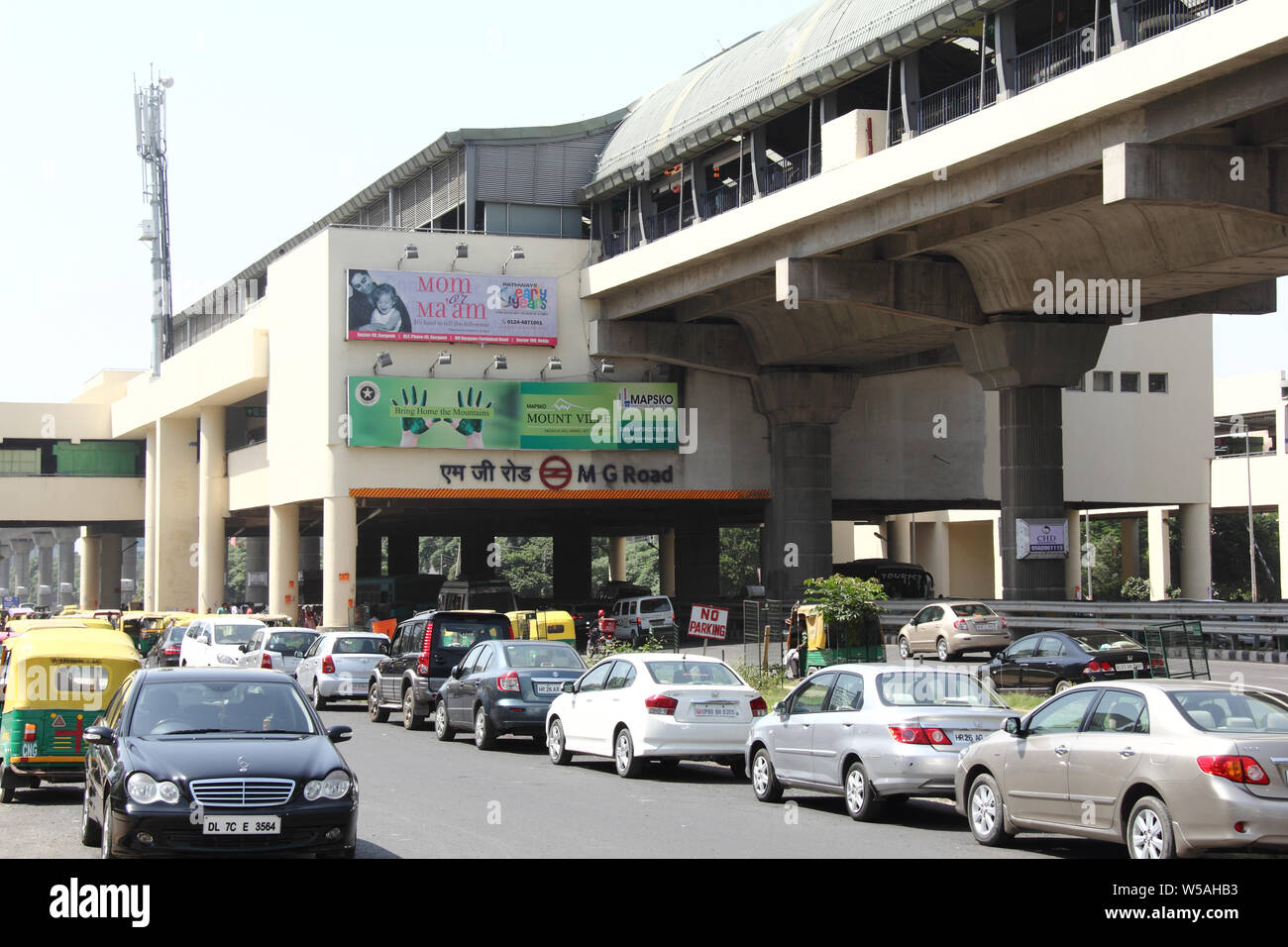 Cars at a metro station, Gurgaon, Haryana, India Stock Photo