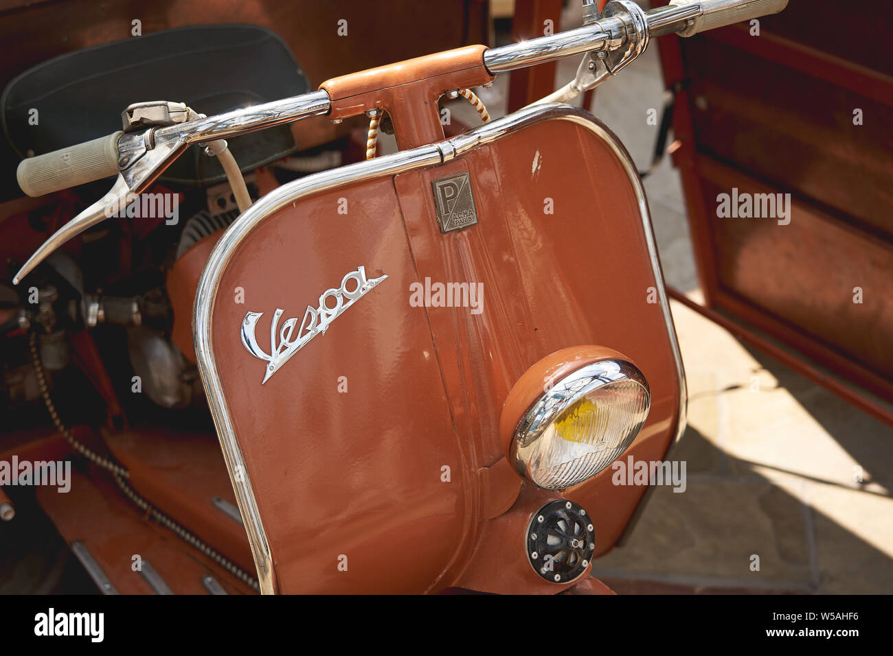 London, UK - July, 2019. Details of a Piaggio Vespa scooter. Stock Photo