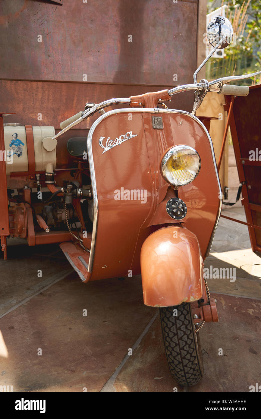 London, UK - July, 2019. Details of a Piaggio Vespa scooter. Stock Photo