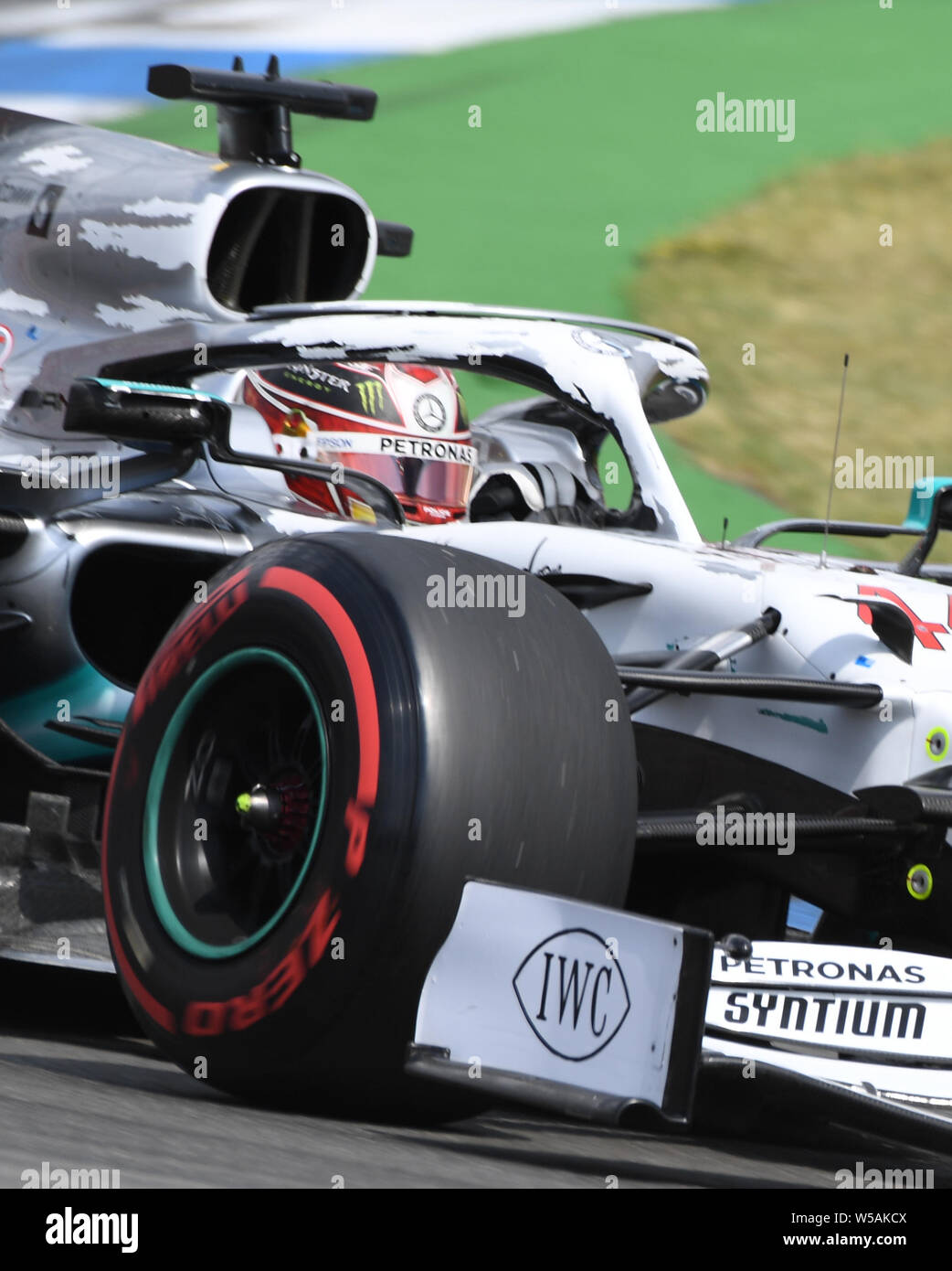 Hockenheim, Germany. 27th July, 2019. Motorsport: Formula 1 World Championship, Grand Prix of Germany. Lewis Hamilton from Great Britain of the Mercedes-AMG Petronas team drives across the track in qualifying. Credit: Uli Deck/dpa/Alamy Live News Stock Photo