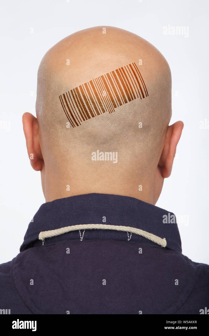 Rear view of a man with barcode printed on his head Stock Photo