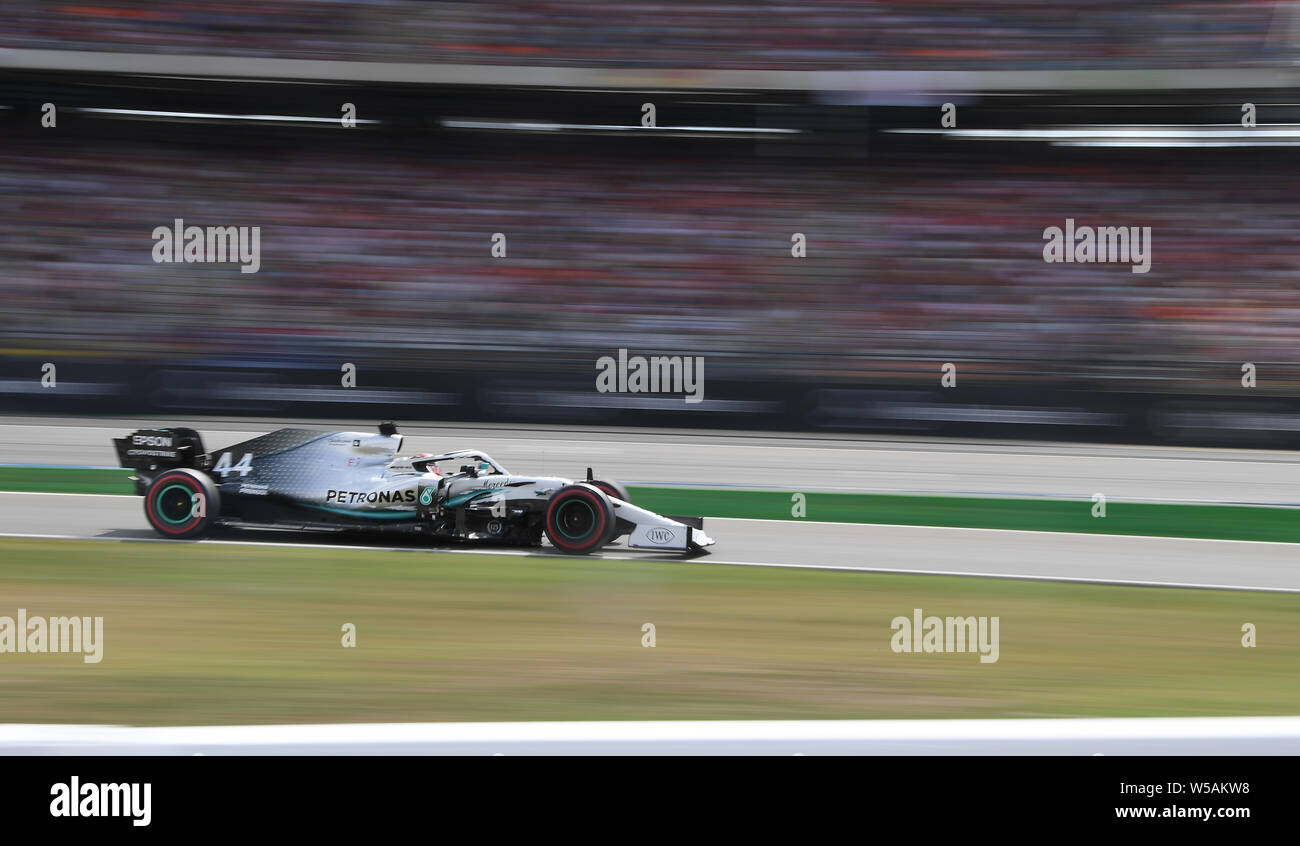 Hockenheim, Germany. 27th July, 2019. Motorsport: Formula 1 World Championship, Grand Prix of Germany. Lewis Hamilton from Great Britain of the Mercedes-AMG Petronas team drives across the track in qualifying. Credit: Sebastian Gollnow/dpa/Alamy Live News Stock Photo