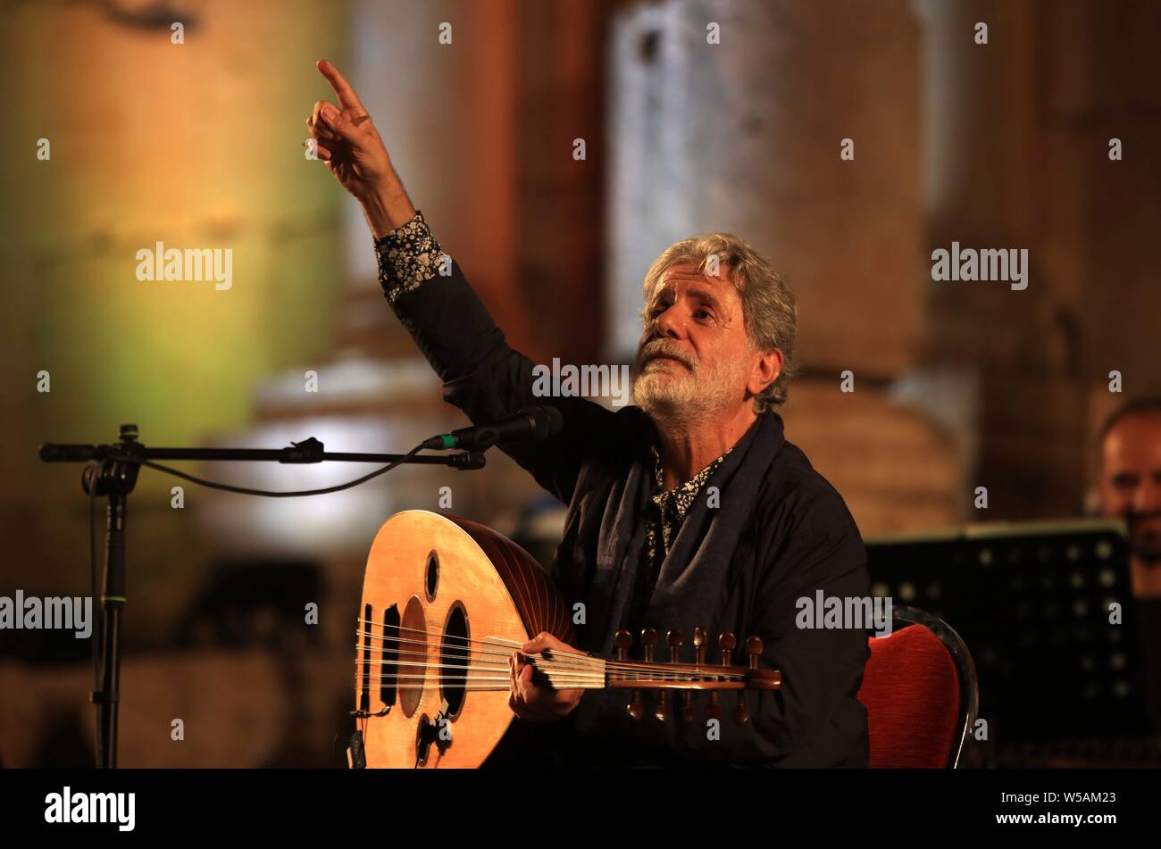 Jerash, Jordan. 27th July, 2019. (190727) -- JERASH, July 27, 2019 (Xinhua) -- Lebanese singer Marcel Khalifa performs during the 2019 Jerash Festival of Culture and Arts at the Jerash archeological site in Jerash, Jordan, July 26, 2019. The Jerash festival is held in the ancient Greco-Roman town of Jerash, 48 km north of Amman, known in the past as Gerasa. In 2011, the government revived the festival, which was first launched in 1981, after a four-year suspension. This year's festival kicked off on the night of July 18 and would last for 10 days. (Photo by Mohammad Abu Ghosh/Xinhua) Credit: X Stock Photo