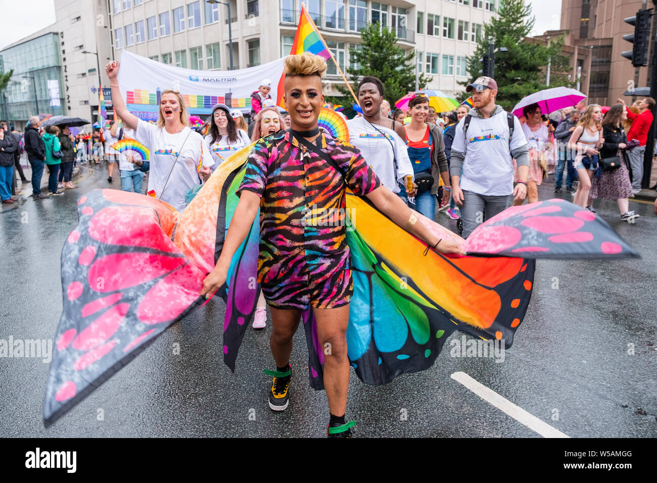 Liverpool, UK. July 27, 2019. Thousands of people, despite the rain, joined a march through Liverpool city centre on Saturday, July 27, 2019 to celebrate LGBT+ and its vibrant community under the slogan, 'Come As You Are'. The event is held annually in commemoration of the death of Michael Causer, a young gay man who was murdered in the city in 2008. Credit: Christopher Middleton/Alamy Live News Stock Photo