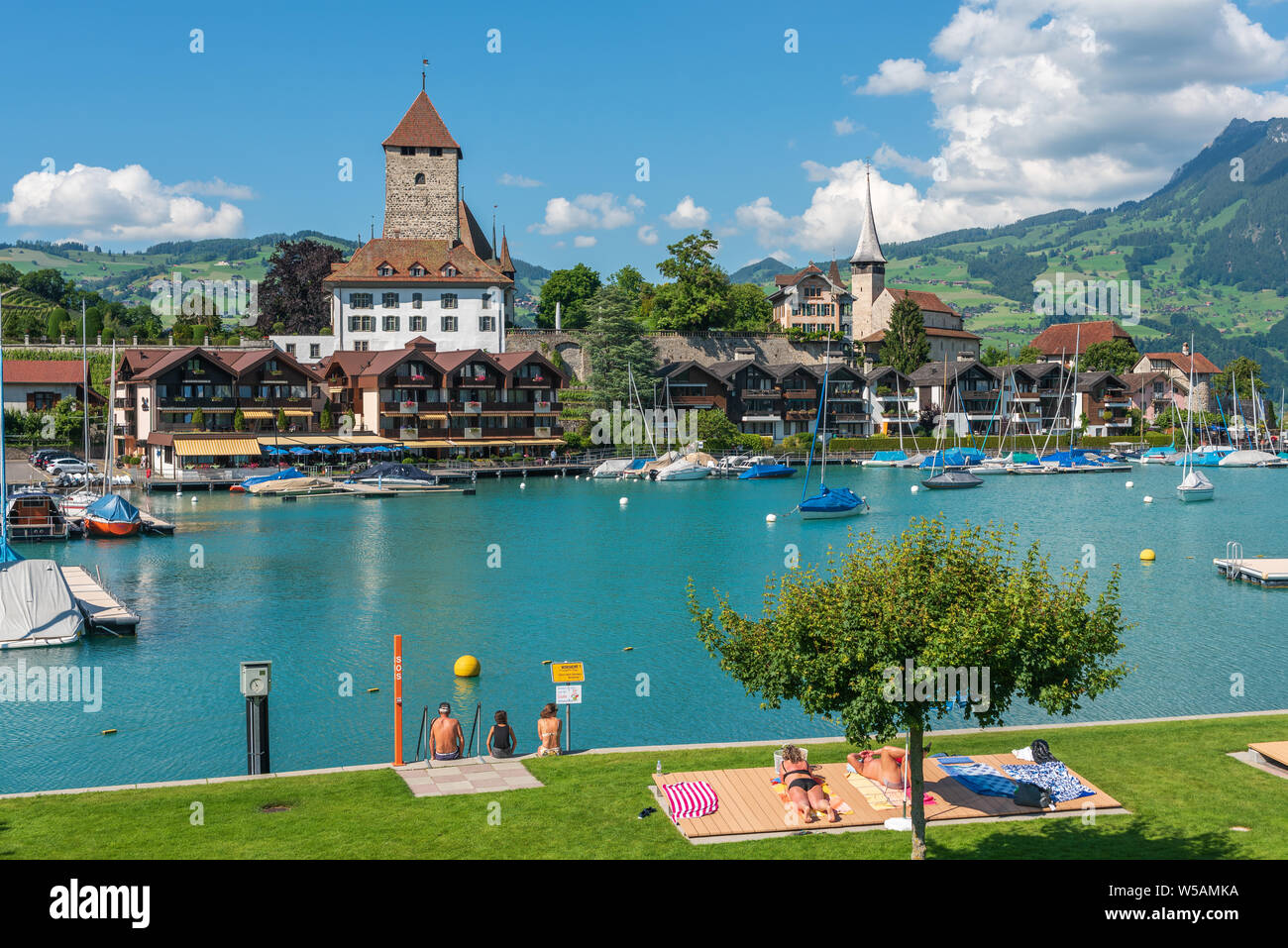 View over the open-air swimming pool to Spiez Castle, Spiez, Bernese Oberland, Switzerland, Europe Stock Photo