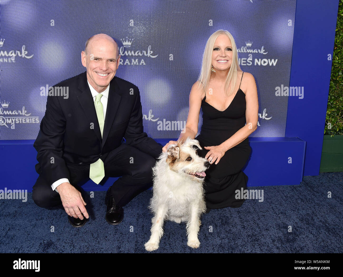 BEVERLY HILLS, CA - JULY 26: William J. Abbott (L) and Michelle Vicary