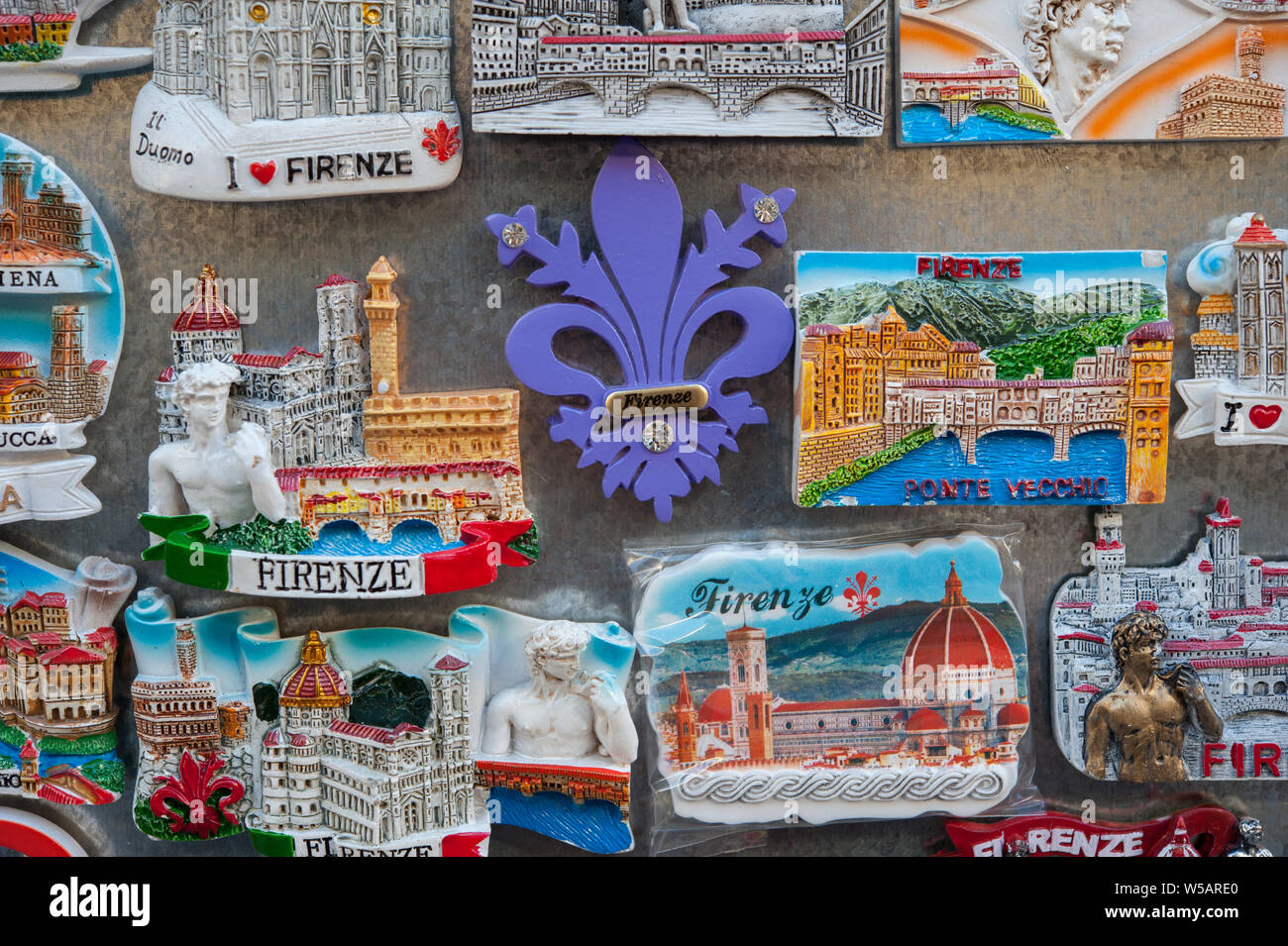 Tourist magnet souvenirs on sale at the market stall in Florence, Italy Stock Photo