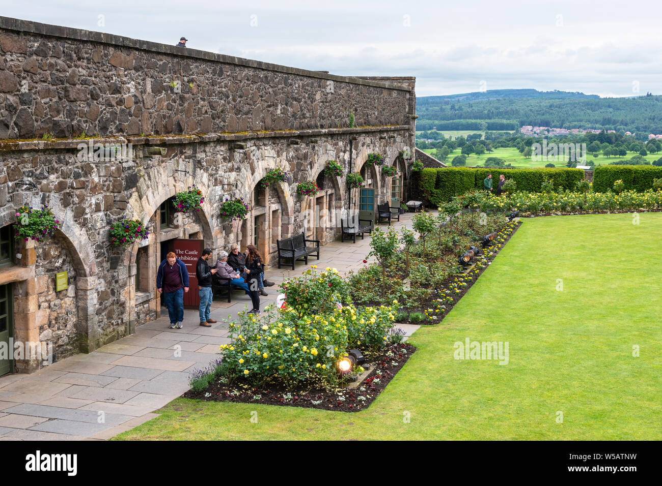 Herbaceous borders in the Queen Anne Gardens with the Outer Defences in the background – Stirling Castle, Scotland, UK Stock Photo