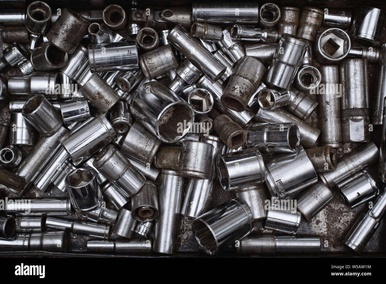 Collection of well used wrench sockets in metal tray Stock Photo Alamy