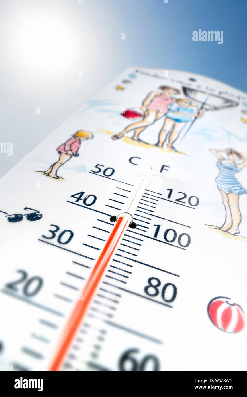 Worm's-eye view of thermometer measures extremely hot temperature of 40 degrees Celsius / 40 °C; 100 °F during heatwave / heat wave in summer Stock Photo