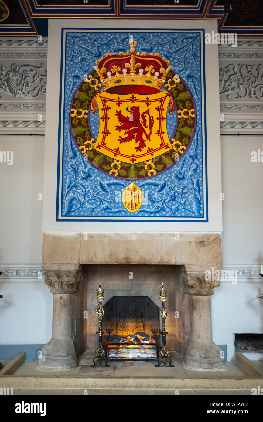 Restored fireplace and tapestry in the Kings Inner Chamber within the Royal Palace - Stirling Castle, Scotland, UK Stock Photo