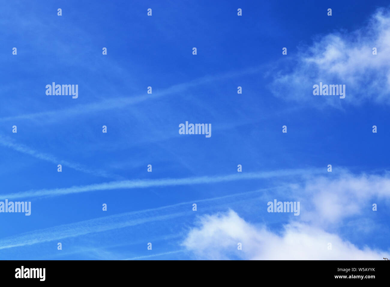 Beautiful white fluffy clouds on a deep blue summer sky Stock Photo - Alamy