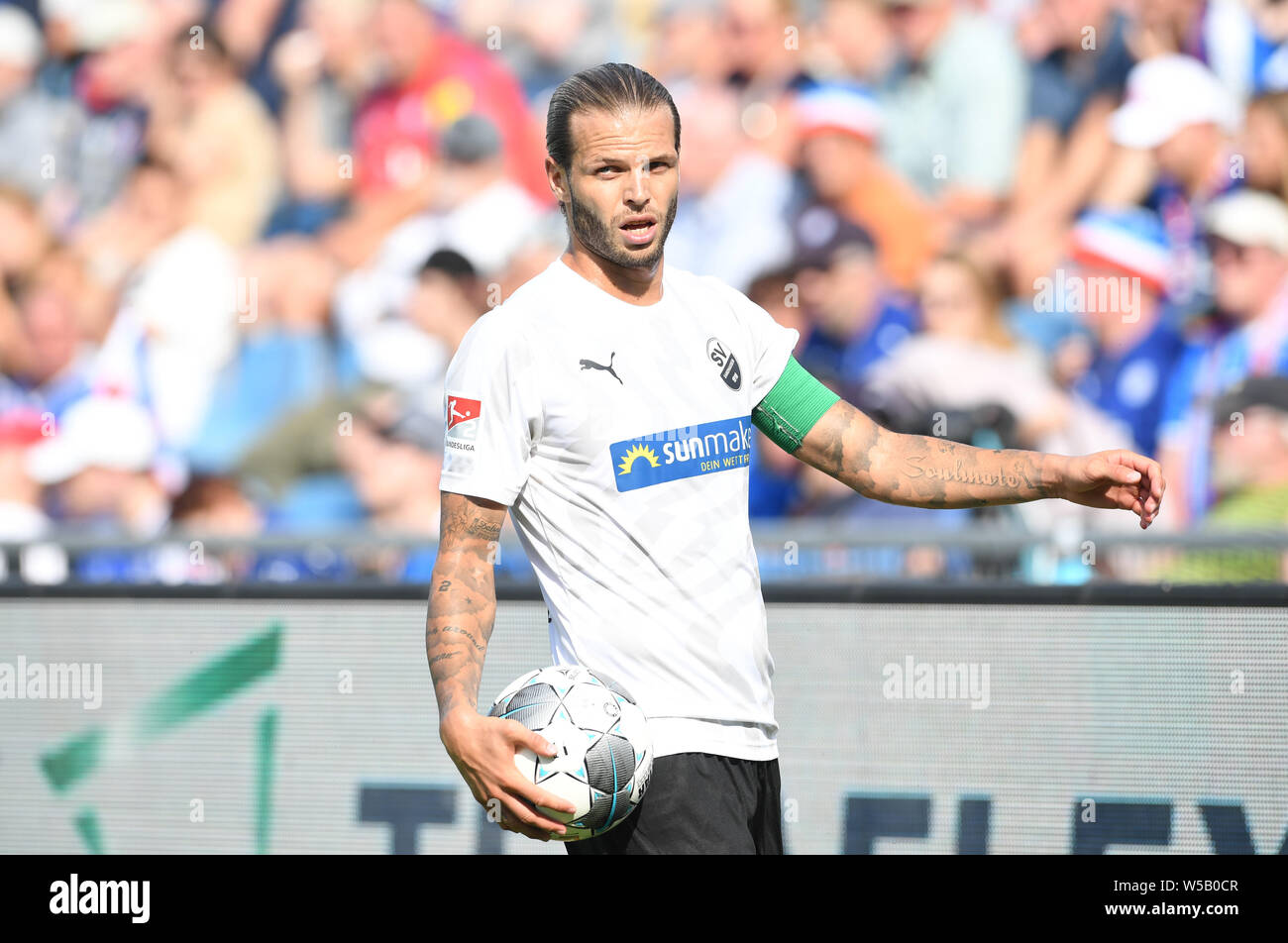 Kiel, Germany. 27th July, 2019. Soccer: 2nd Bundesliga, Holstein Kiel - SV Sandhausen, 1st matchday. Sandhausen's Dennis Diekmeier is at the throw-in. Credit: Carmen Jaspersen/dpa - IMPORTANT NOTE: In accordance with the requirements of the DFL Deutsche Fußball Liga or the DFB Deutscher Fußball-Bund, it is prohibited to use or have used photographs taken in the stadium and/or the match in the form of sequence images and/or video-like photo sequences./dpa/Alamy Live News Stock Photo