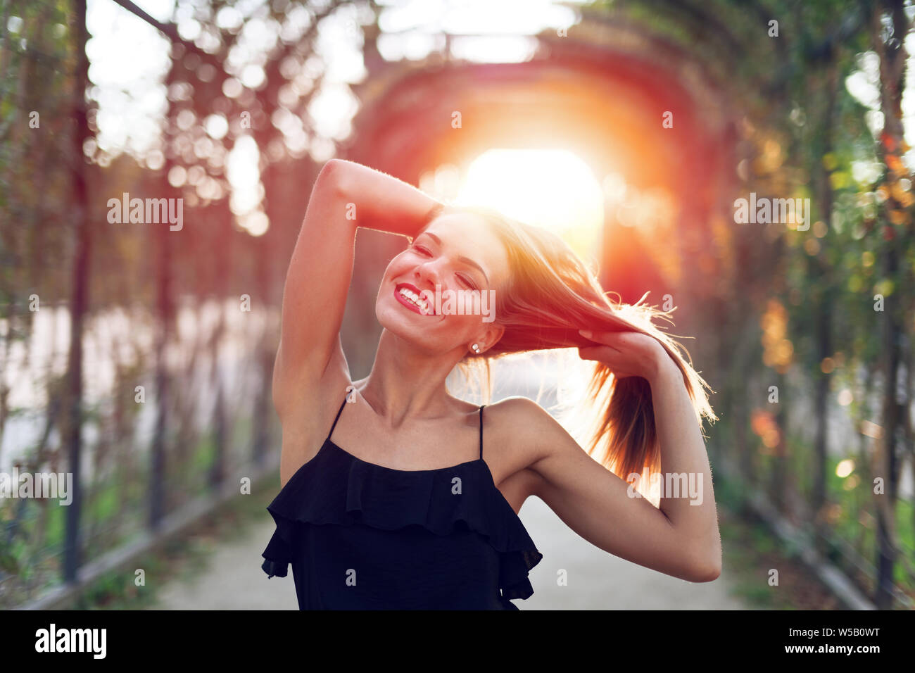 Woman happy park summer alone hi-res stock photography and images - Alamy