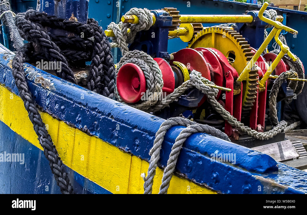 Ropes and winding gear on a boat in Swansea Marina. Swansea, Wales, UK. Stock Photo