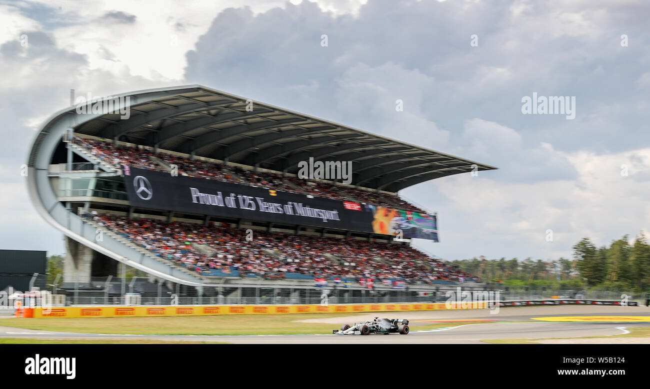 Hockenheim, Germany. 27th July, 2019. Motorsport: Formula 1 World Championship, Grand Prix of Germany. Lewis Hamilton from Great Britain from the Mercedes-AMG Petronas (l) team drives across the track in qualifying. Credit: Jan Woitas/dpa-Zentralbild/dpa/Alamy Live News Stock Photo