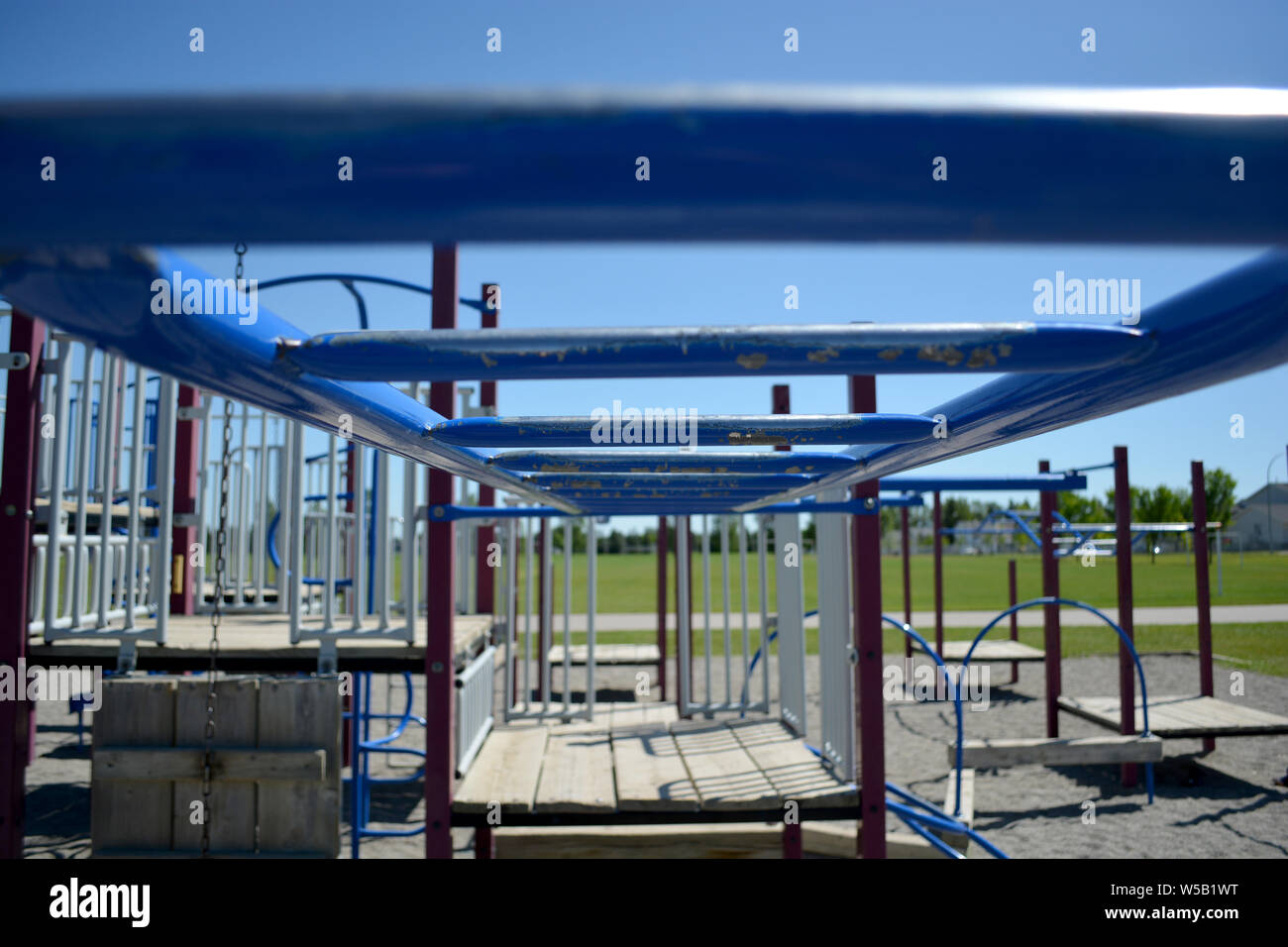 Colourful playground monkey bars in school yard Stock Photo Alamy