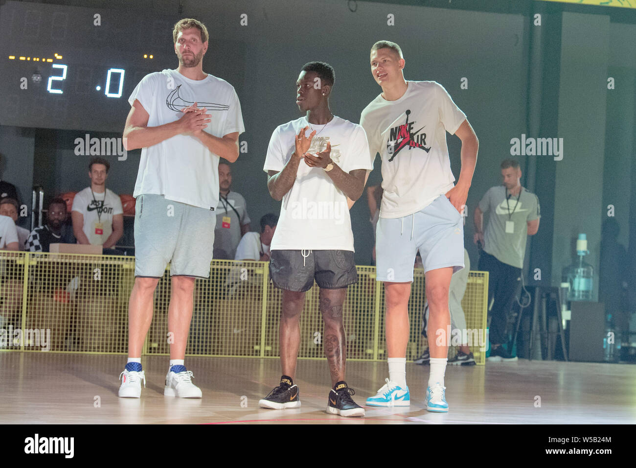 27 July 2019, Berlin: Professional basketball players Dirk Nowitzki (l-r),  Dennis Schröder and Moritz Wagner at a Nike basketball festival. Photo:  Jörg Carstensen/dpa Stock Photo - Alamy