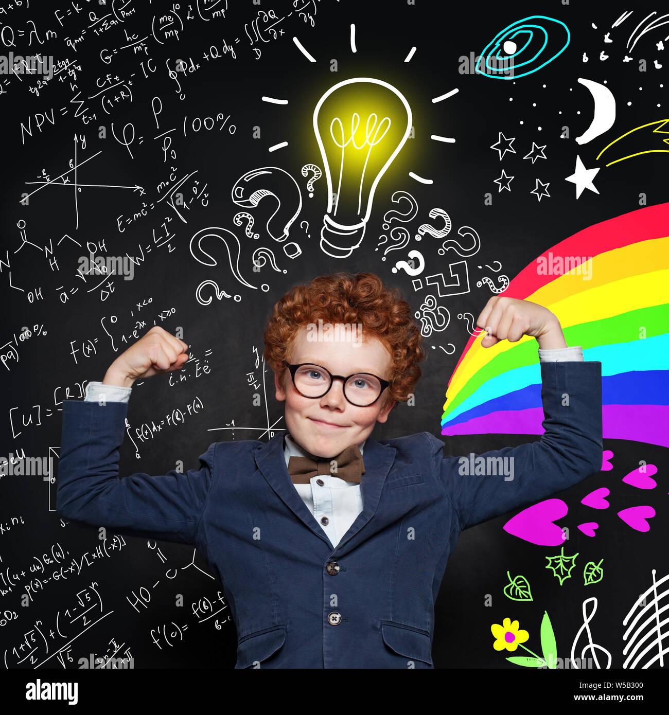 Smart boy in glasses with lightbulb on blackboard background. Brainstorming and idea concept Stock Photo